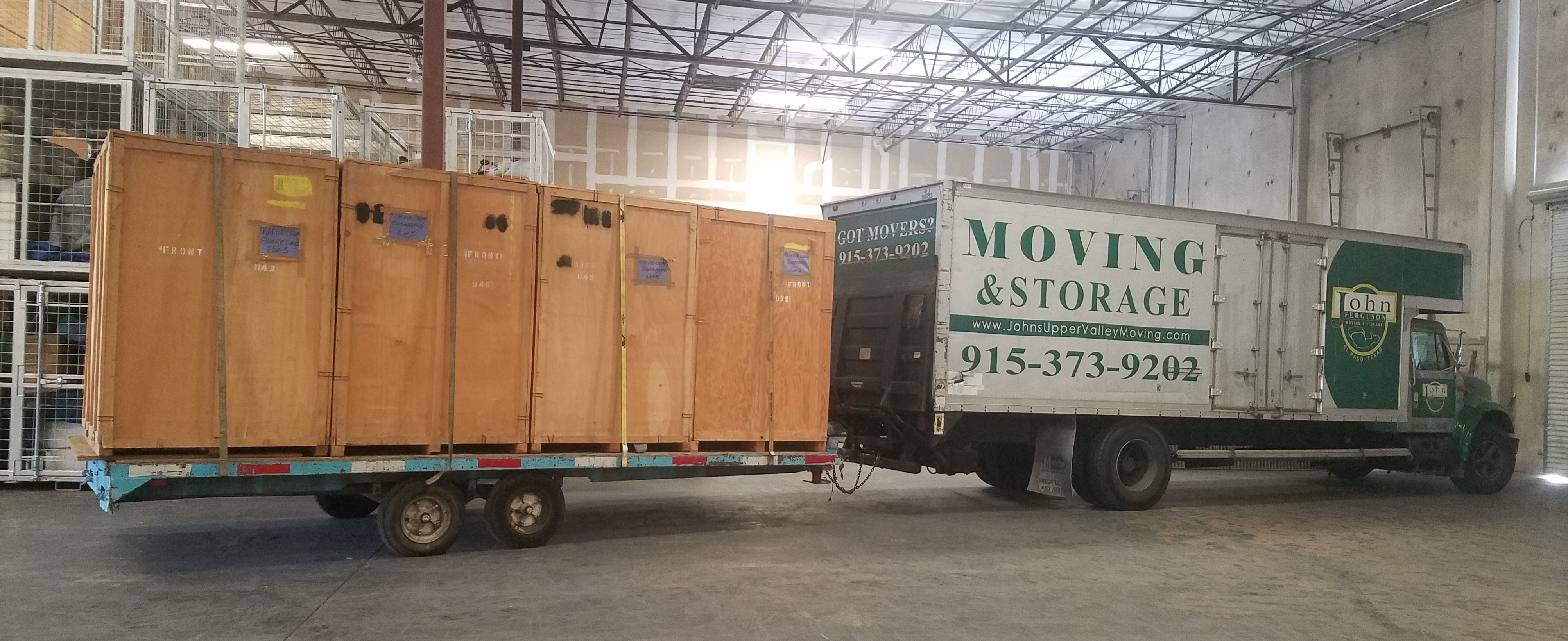 moving truck inside warehouse