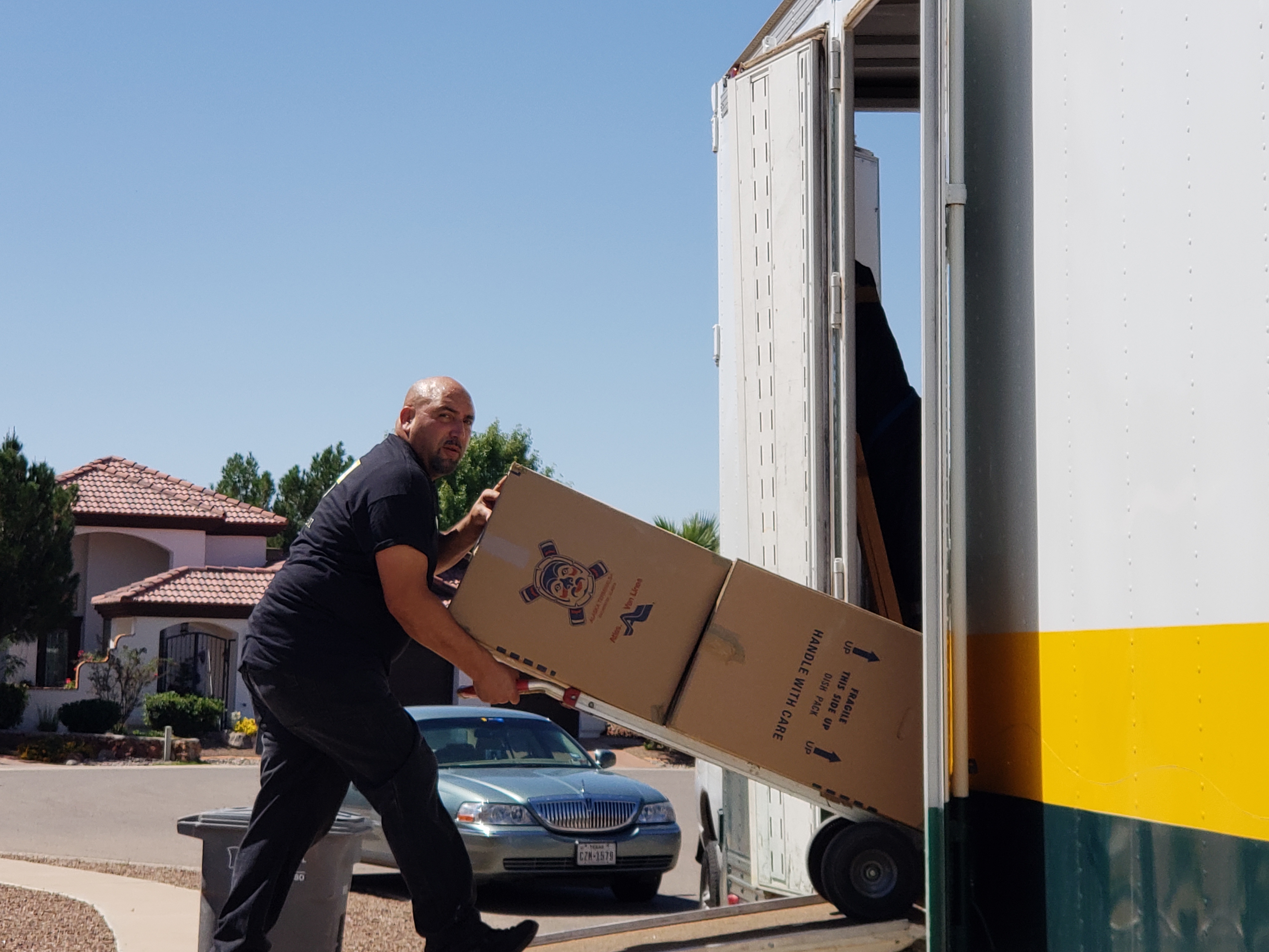 moving boxes into truck